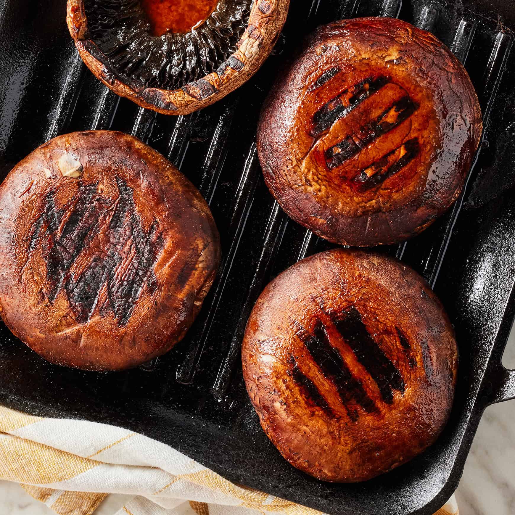 Grilling portobello mushrooms on grill pan