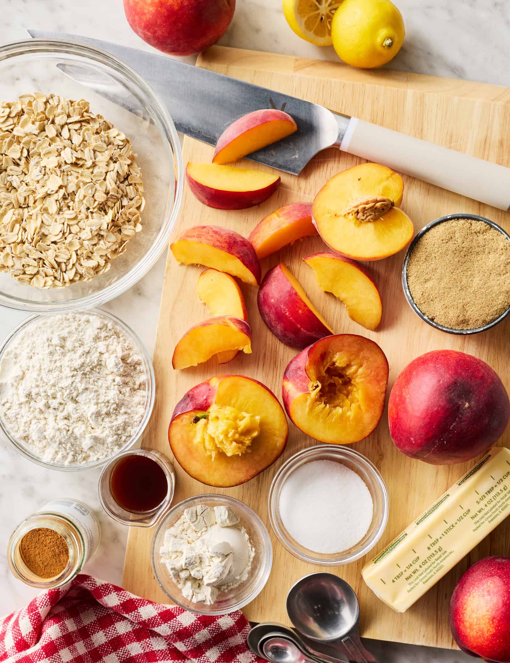 Peach crisp recipe ingredients on countertop