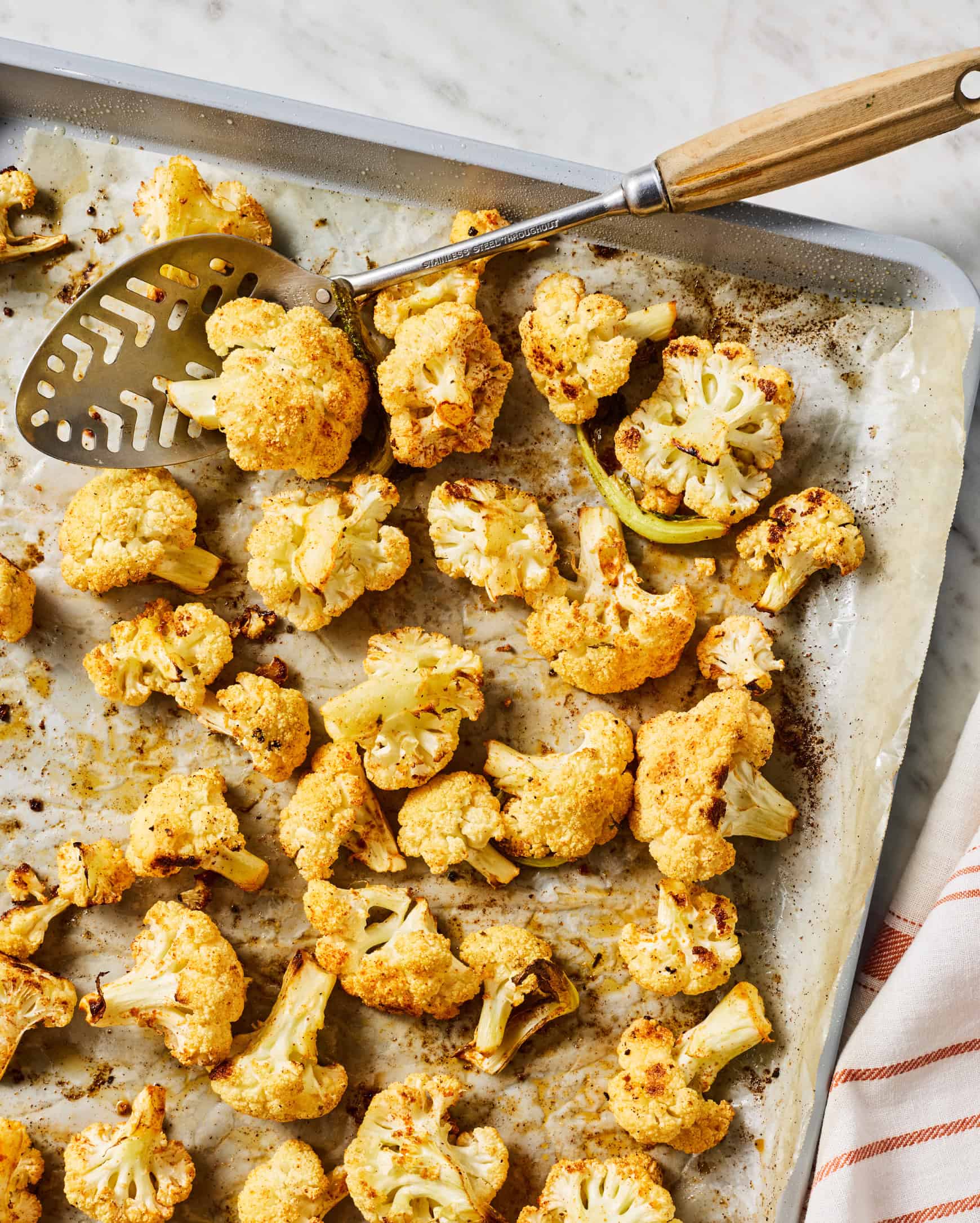Roasted cauliflower on baking sheet