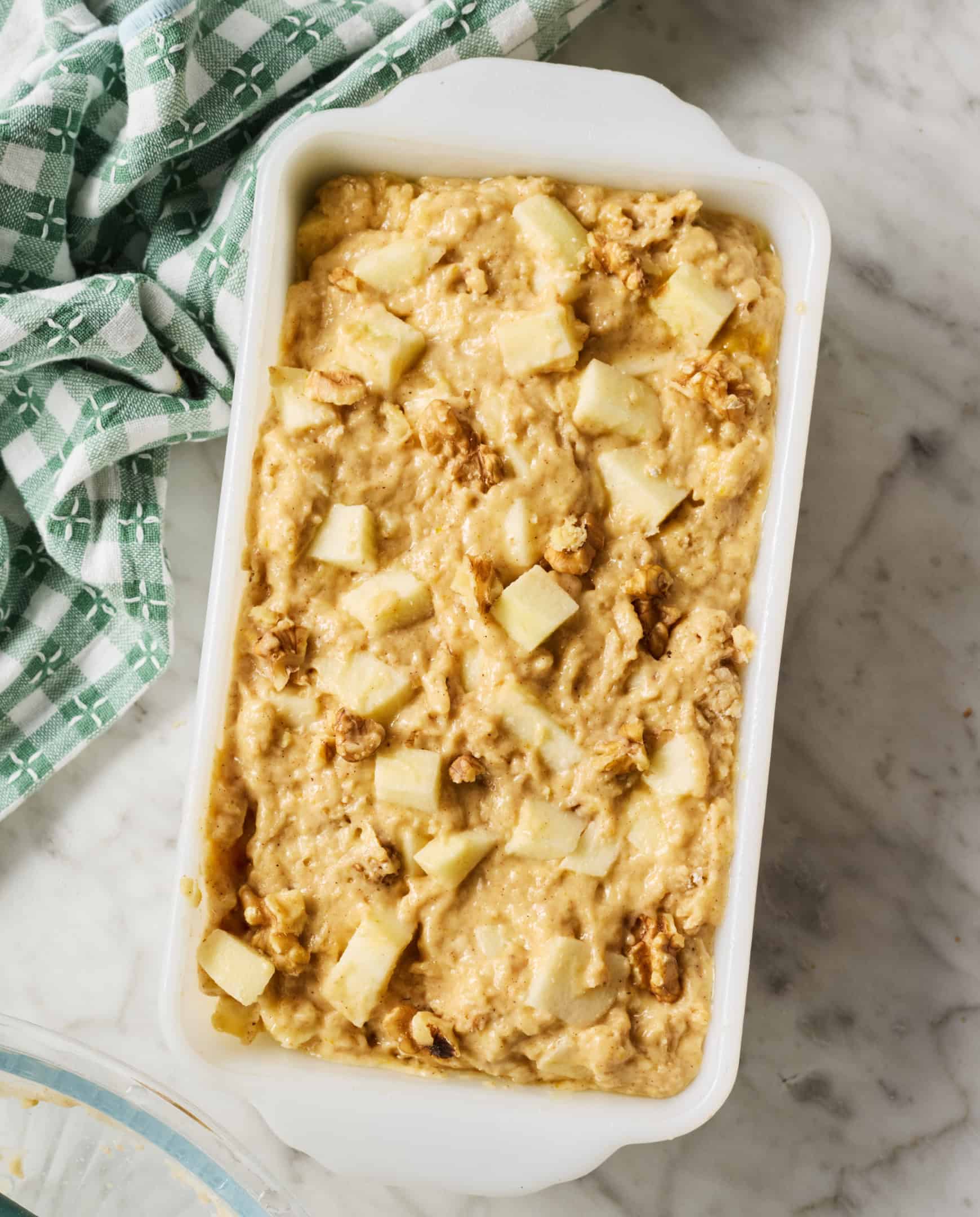 Apple cinnamon bread batter in loaf pan