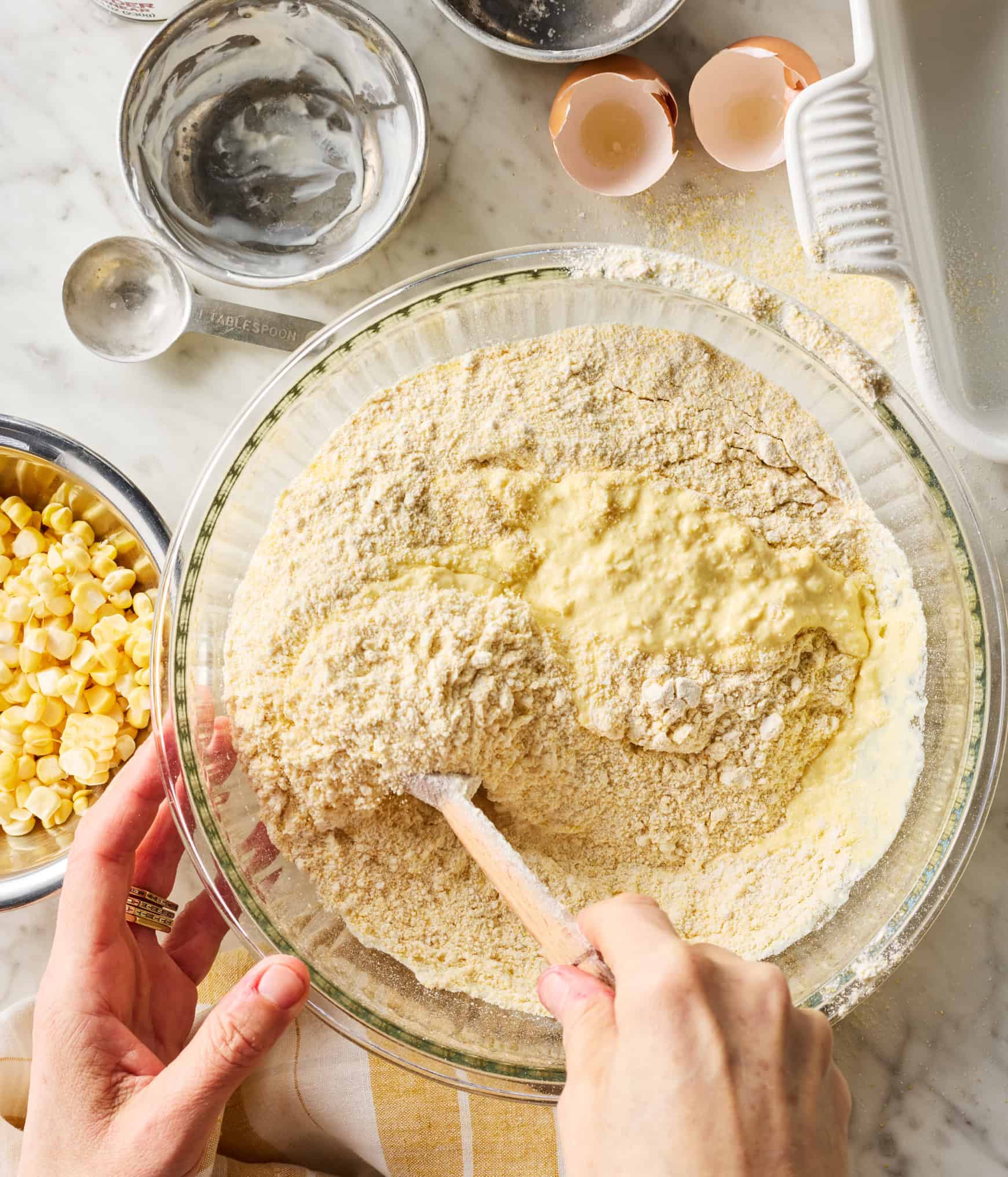Mixing dry ingredients in glass bowl