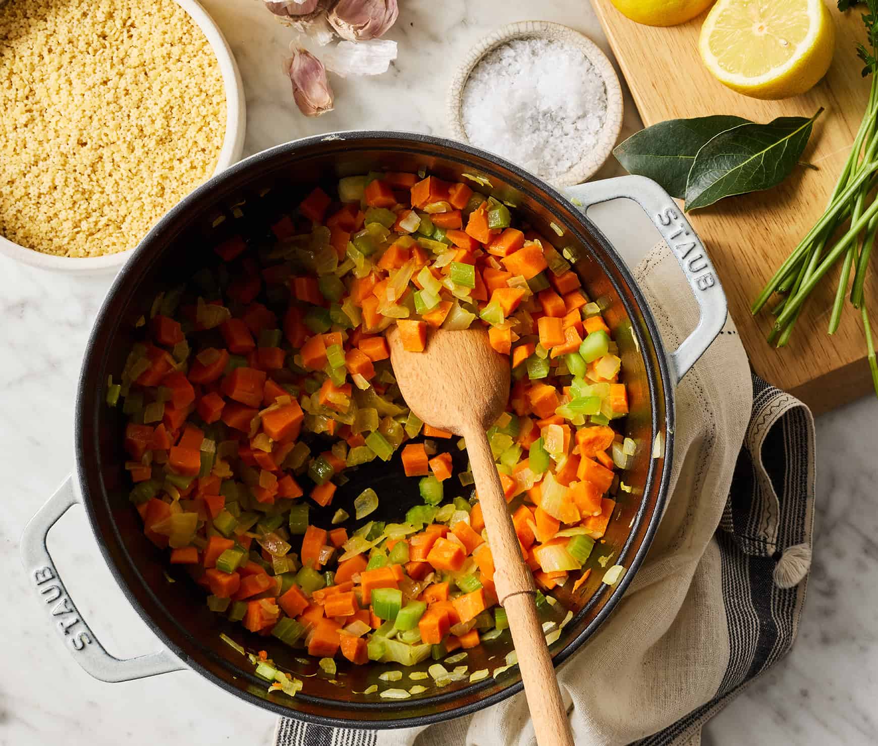 Sautéing onions, celery, and carrots in Dutch oven